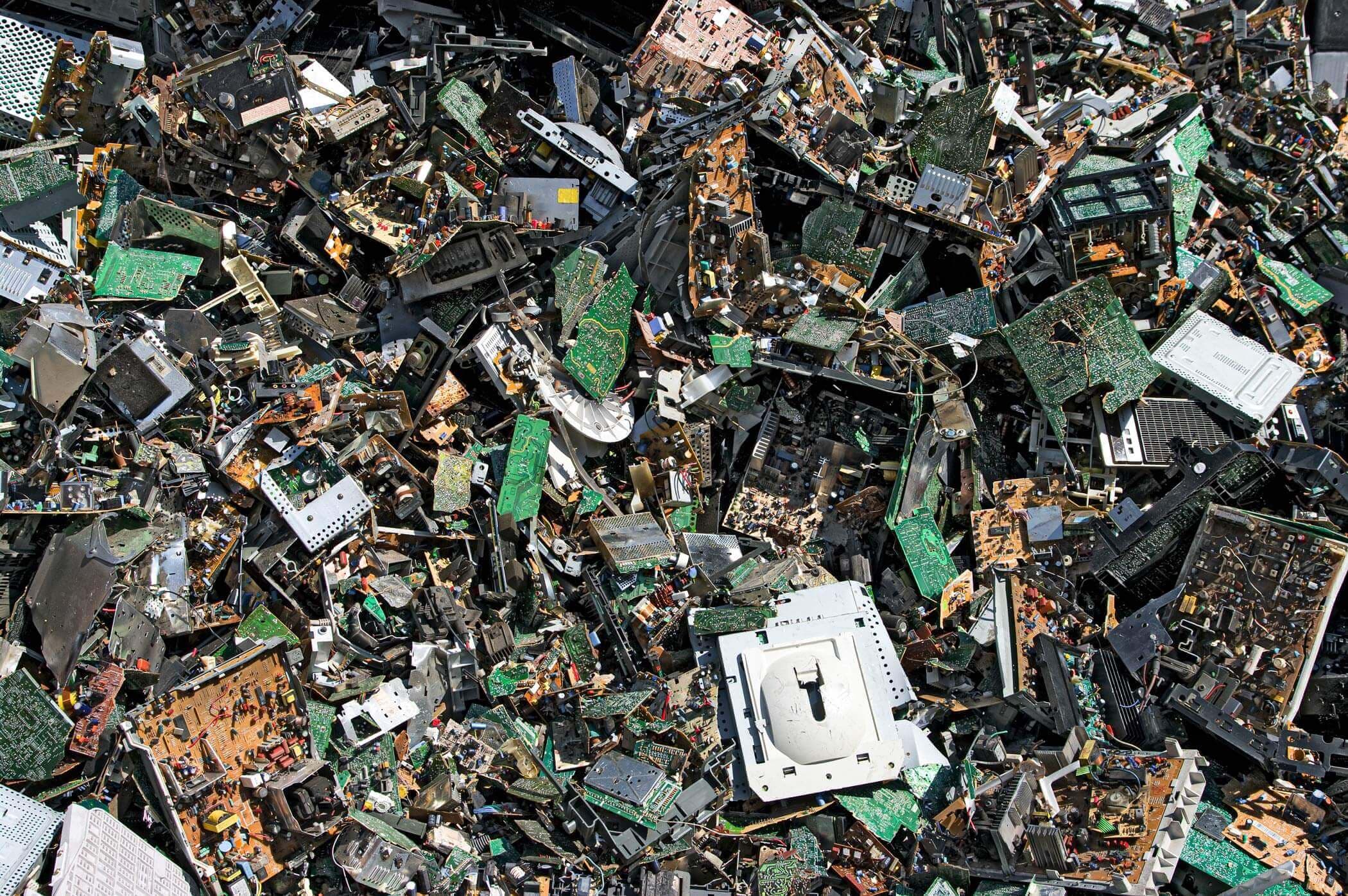 Organized e-waste components prepared for recycling